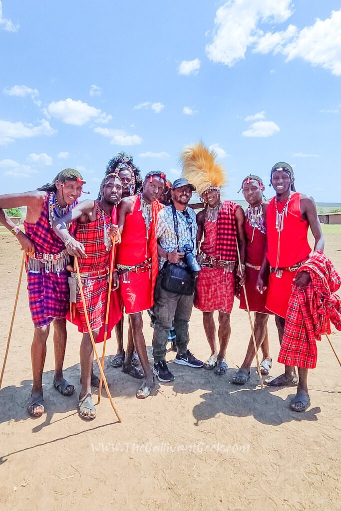 Group photo with Maasai men in red shukas in the Masai Mara