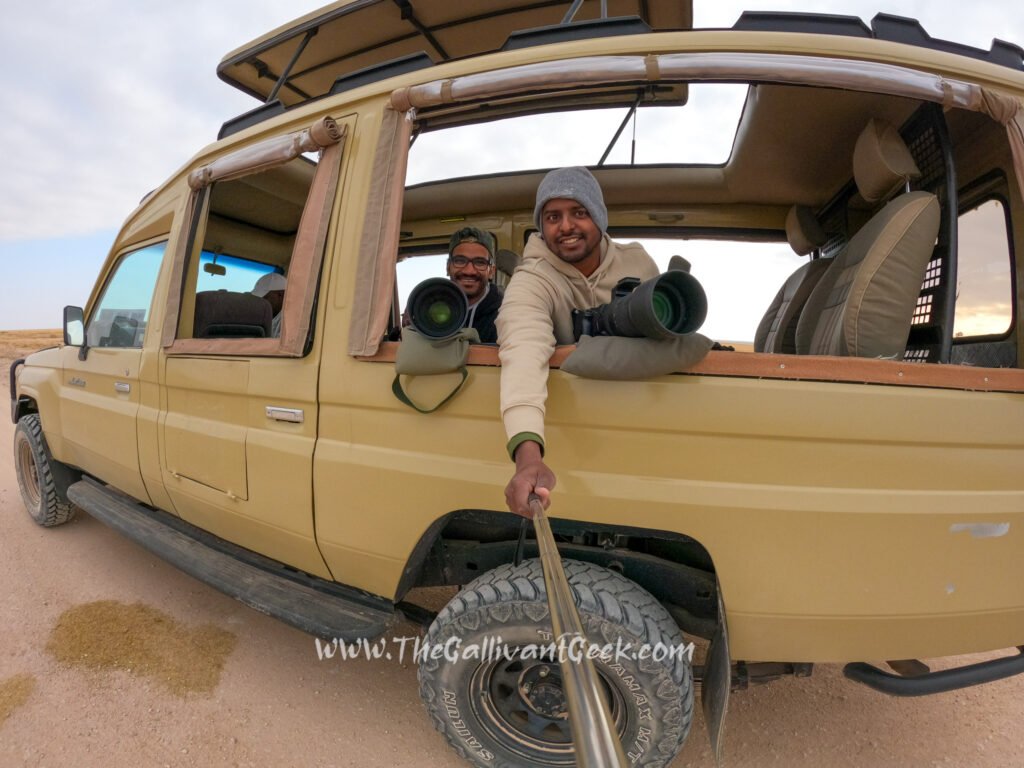 Plan a Kenya safari: our 4x4 safari vehicle with a pop-up roof in the Masai Mara